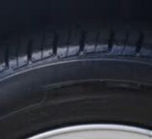 Load image into Gallery viewer, Photo of Front Left Tire (Showing tread depth)

