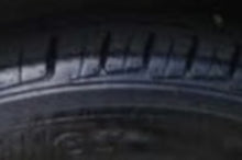 Load image into Gallery viewer, Photo of Rear Left Tire (Showing tread depth)
